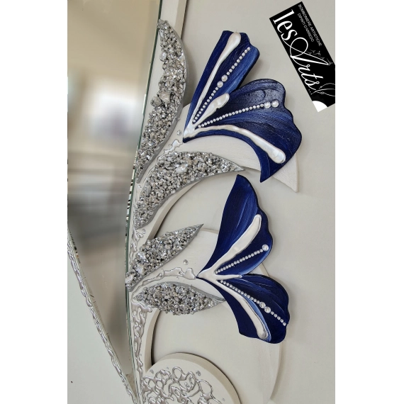 Specchiera foglia con fiori blu